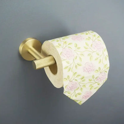 Modern brushed gold toilet paper holder with floral tissue roll from decorbites brushed gold bathroom accessories set