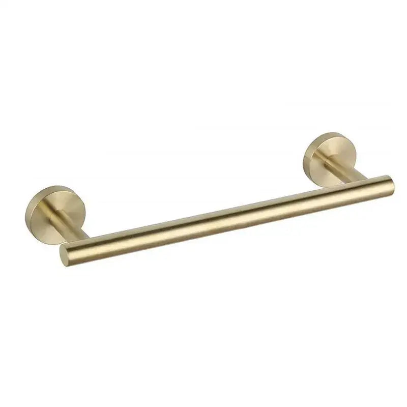 Modern brushed gold bathroom accessory set featuring a sleek cylindrical towel rack with minimalist circular wall mounts