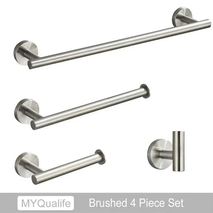 Modern brushed gold bathroom hardware set with towel bar toilet paper holder and smaller bars in brushed stainless steel