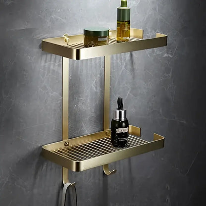 Modern brushed gold brass bath hardware set featuring a gold double-tier bathroom shelf with perforated metal trays