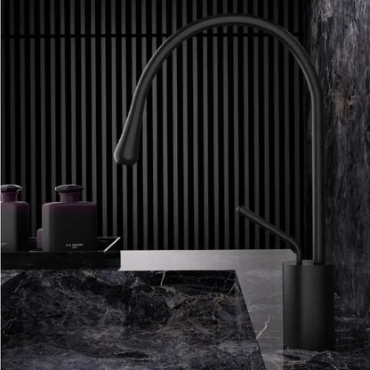 Black matte kitchen faucet with sleek curved spout and cylindrical base for modern brushed gold brass kitchen sink tap