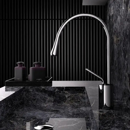 Modern brushed gold brass kitchen faucet with sleek curved spout and minimalist chrome-finished design