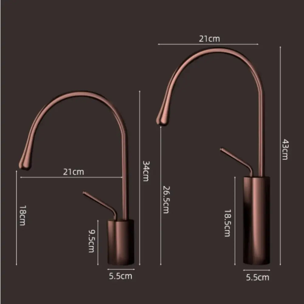 Two modern copper-finished kitchen faucets with sleek curved spouts and cylindrical bases for kitchen sink use