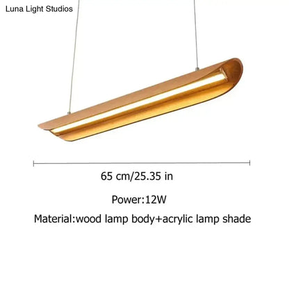 Modern brushed gold kitchen island light fixture with sleek wooden body and acrylic shade for wood chandeliers kitchen