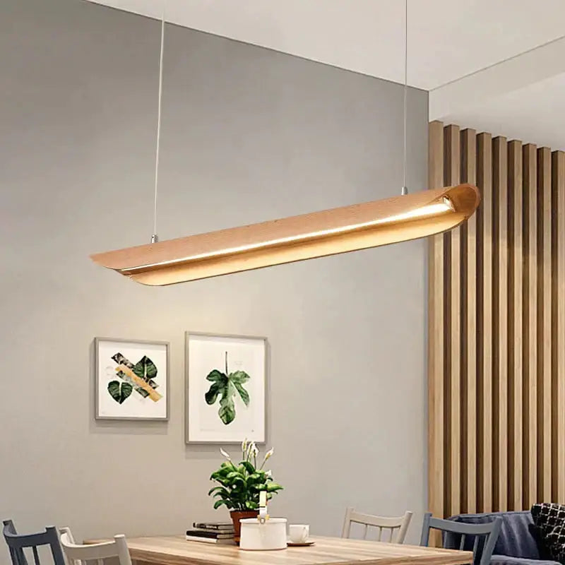 A sleek modern pendant kitchen island light with brushed gold finish and minimalist design for chandeliers kitchen island