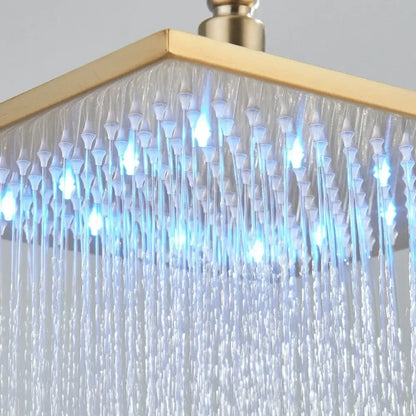 Modern brushed gold shower head with led lights and multiple spray patterns emitting cascading water droplets