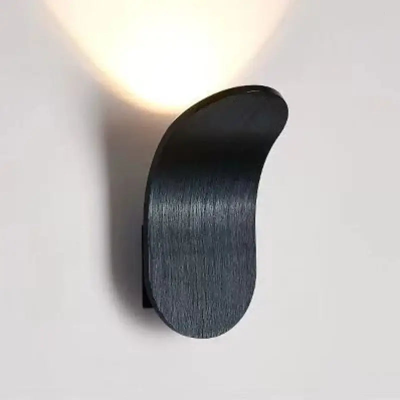 Black brushed metal led wall lamp with sleek curved design modern wall sconce for living room lighting