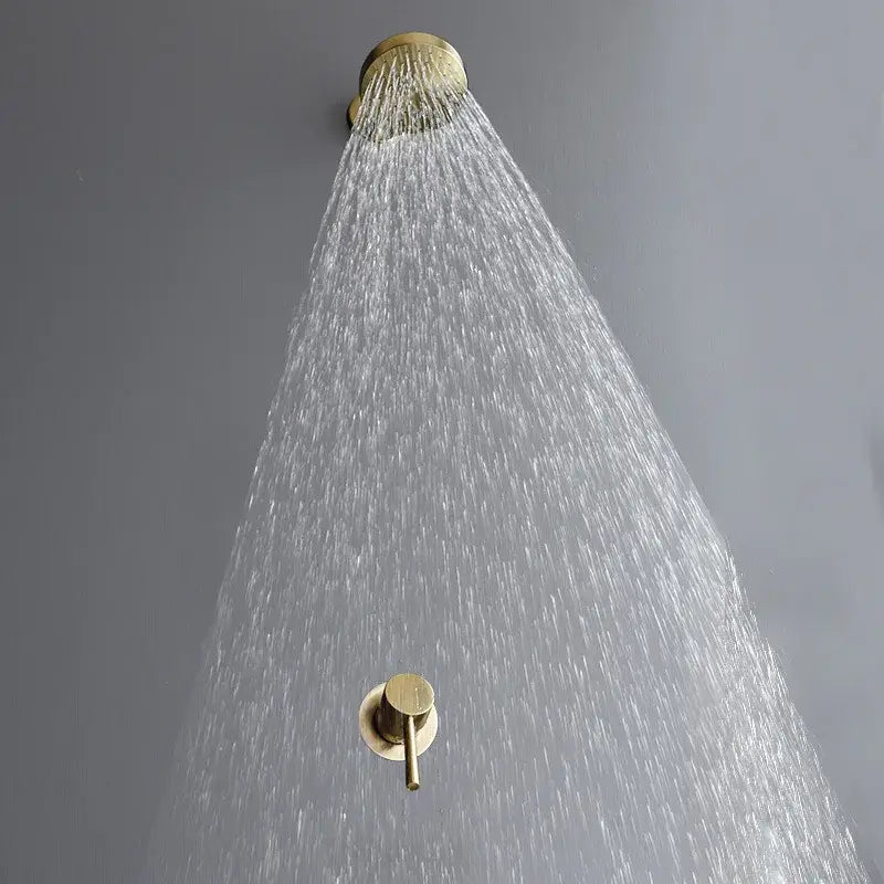 Modern brushed gold rainfall shower faucet set featuring a gold-toned rain shower head and matching wall-mounted valve