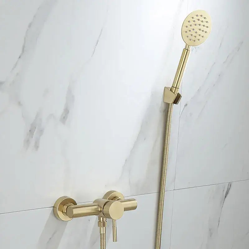 Modern brushed gold shower faucet set with gold-finished shower head and matching wall-mounted faucet for bathroom use