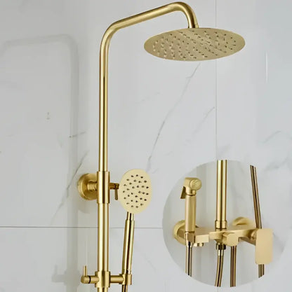 Modern brushed gold shower faucet set with a round rainhead and handheld sprayer in a sleek metallic finish