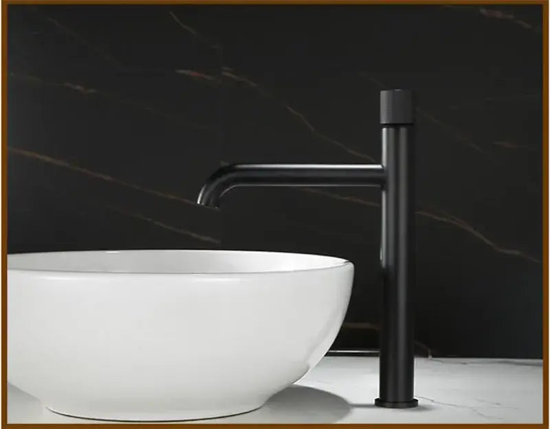 Black matte basin faucet with sleek minimalist design for modern bathroom featuring single handle control