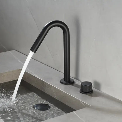 Modern brushed gold single handle bathroom basin faucet with black matte curved spout and premium ceramic valve knob