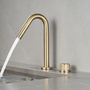 Modern brushed gold single handle bathroom basin faucet with brass finish, sleek curved spout, and premium ceramic valve