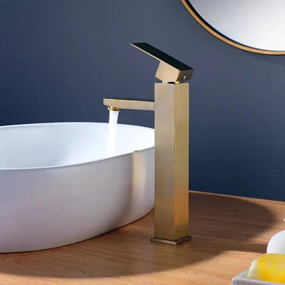 Modern brushed gold stainless steel basin mixer faucet with sleek rectangular design and black ceramic handle by decorbites