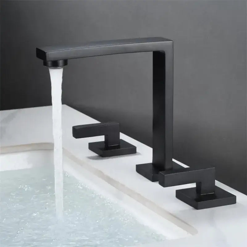 Black matte basin faucet with rectangular spout and three square handles for modern brushed gold bathroom decorbites design