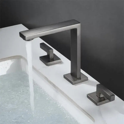 Modern matte black basin faucet with sleek rectangular design and three square handles for bathroom sink decorbites brushed gold