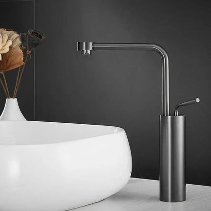 Modern brushed gold faucet swivel sink with a sleek matte black cylindrical base and curved spout by decorbites
