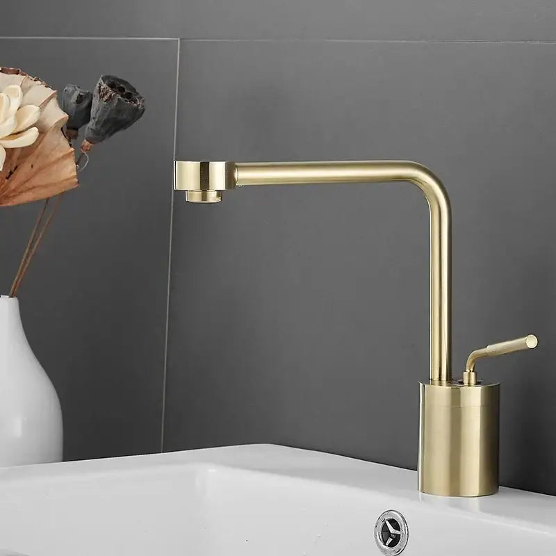 Modern brushed gold waterfall faucet swivel sink with a sleek cylindrical base in decorbites brushed gold finish