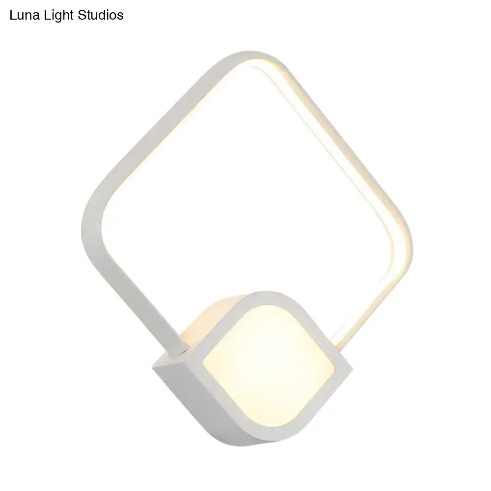 Modern brushed gold and white led wall sconce with geometric acrylic frame and maximum bulb wattage 15w for bedroom use