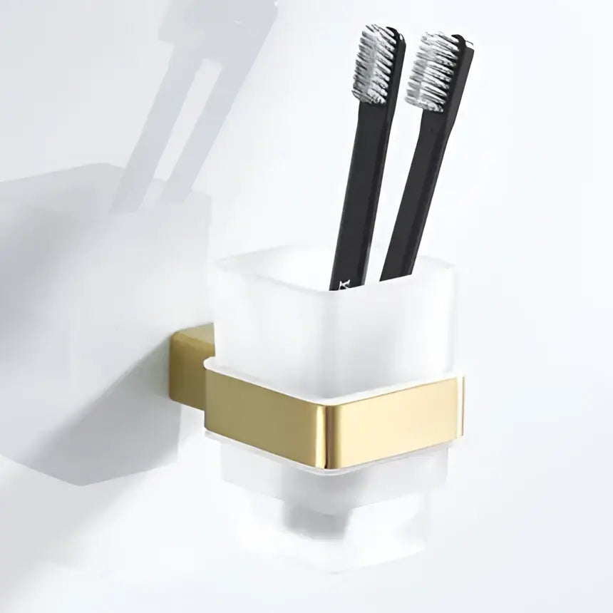 Modern brushed matt gold decorbites bath set translucent gold-accented glass toothbrush holder with black toothbrushes