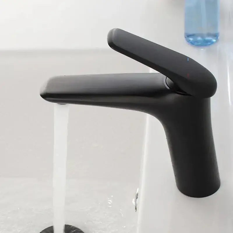 Modern black matte basin faucet mixer tap with sleek minimalist design by decorbites for bathroom use