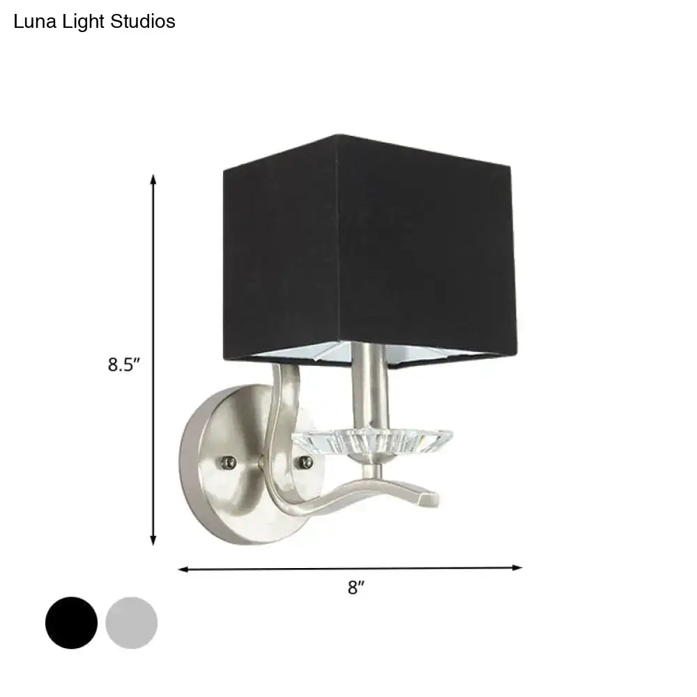Modern brushed nickel cube bedside wall lamp with black fabric shade and crystal accent for bedroom use
