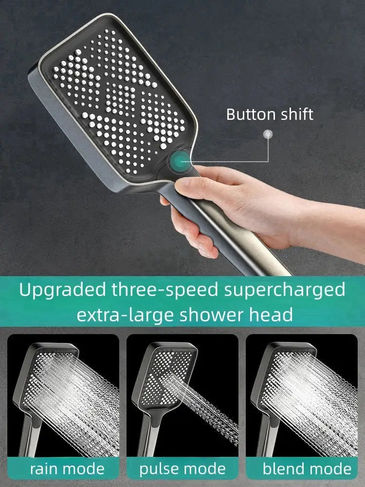 Black rectangular electric sunflower rainfall shower head with green mode button and three spray settings in brushed nickel bathroom set