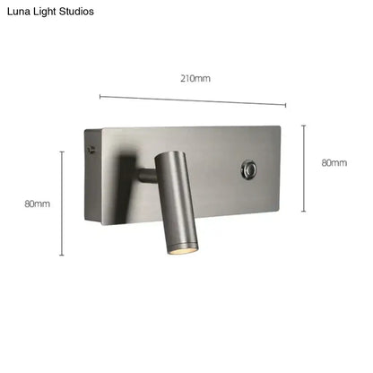 Modern brushed nickel led dimmable reading wall light with a sleek cylindrical head and rectangular base for bedroom use