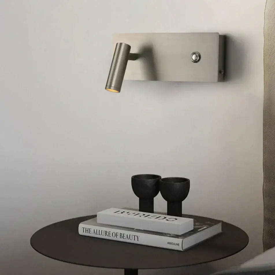 Modern brushed nickel led dimmable reading wall light with cylindrical head and adjustable arm for bedroom use