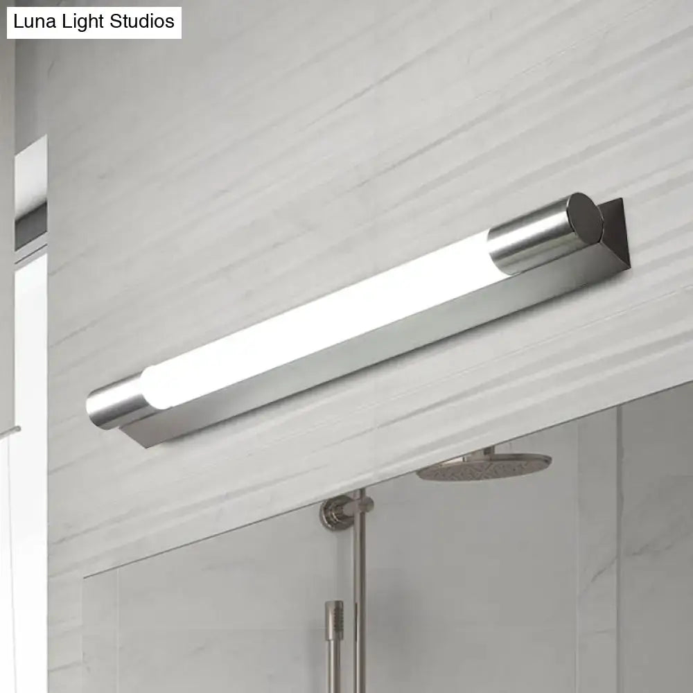 Modern chrome-finished vanity wall light with frosted glass diffuser providing warm white light for bathrooms