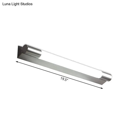 Modern brushed nickel wall light with stainless steel cylindrical design and frosted glass diffuser emitting warm white light