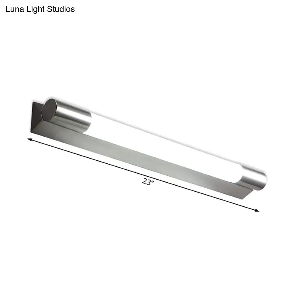 A sleek 23-inch modern brushed nickel led wall light with warm white light and cylindrical brushed stainless steel ends