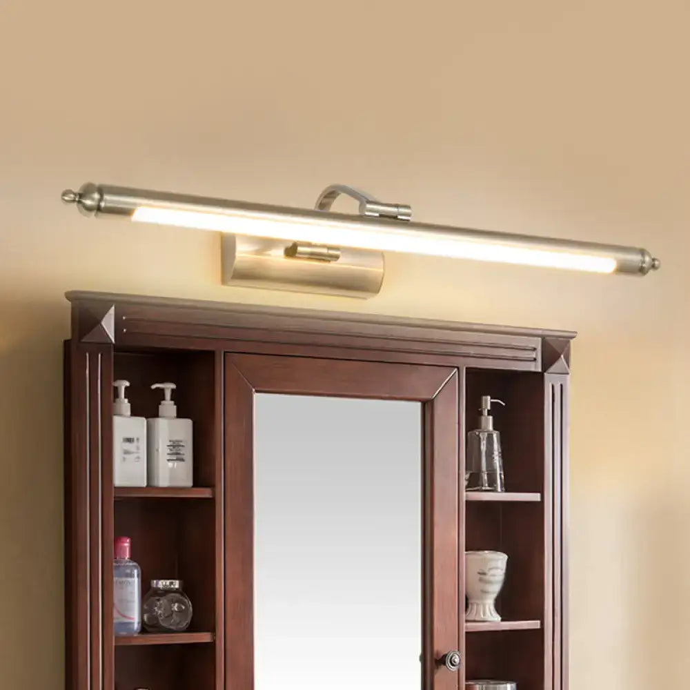 A modern brushed nickel led wall sconce with frosted glass diffuser providing warm white light for restrooms