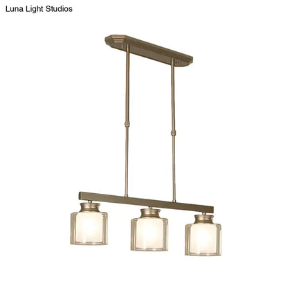 DecorBites traditional gold three-light pendant fixture with bronze finish and clear glass shade ideal for dining rooms