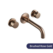 Brushed rose gold wall-mounted faucet with dual handle valve control and curved spout for modern bathroom use