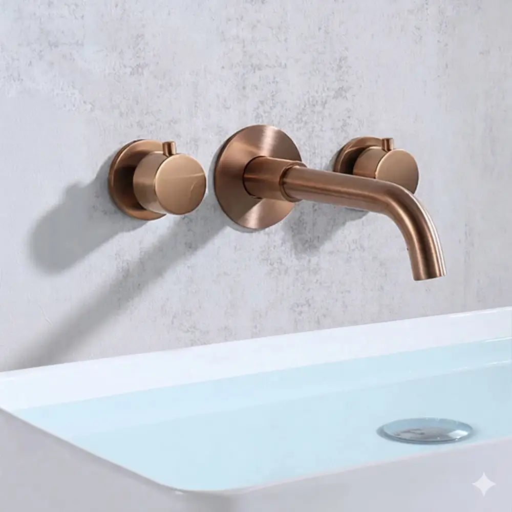 Modern brushed gold dual handle wall mount faucet with valve control and sleek copper-finished minimalist design