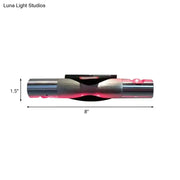 Modern brushed silver led light bedroom sconce with sleek metallic design and pink glowing accents maximum bulb wattage included