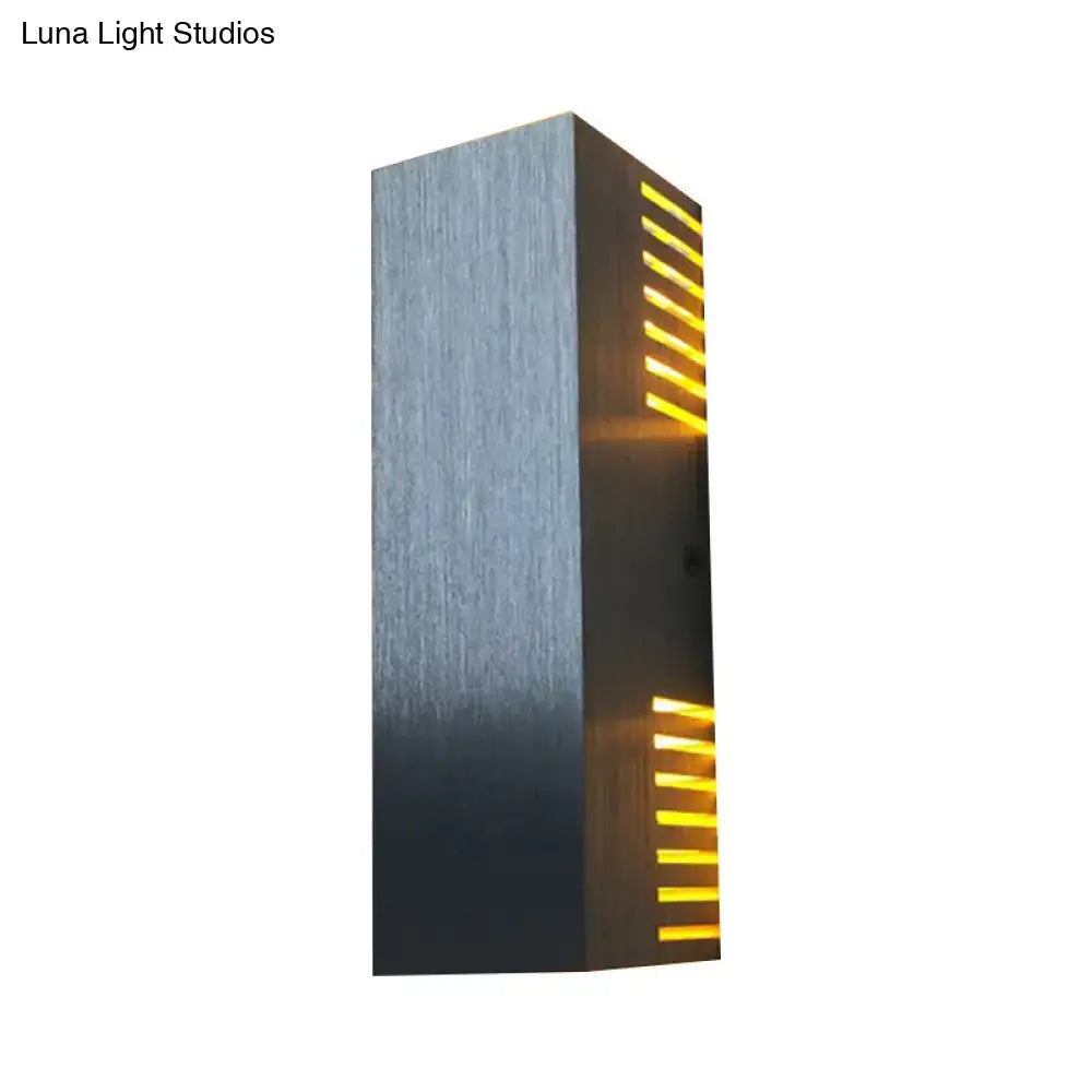Modern brushed silver wall light with warm white vertical led strips and brushed metallic finish for bedroom sconce