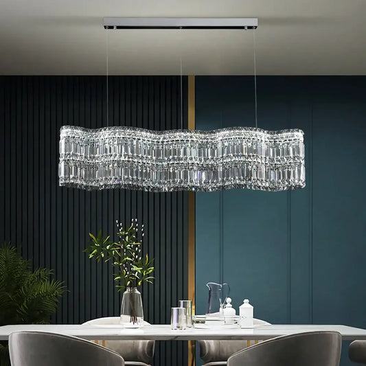 Modern brushed stainless crystal pendant light chandelier with wavy clear crystal prisms and minimalist silver mount for dining room
