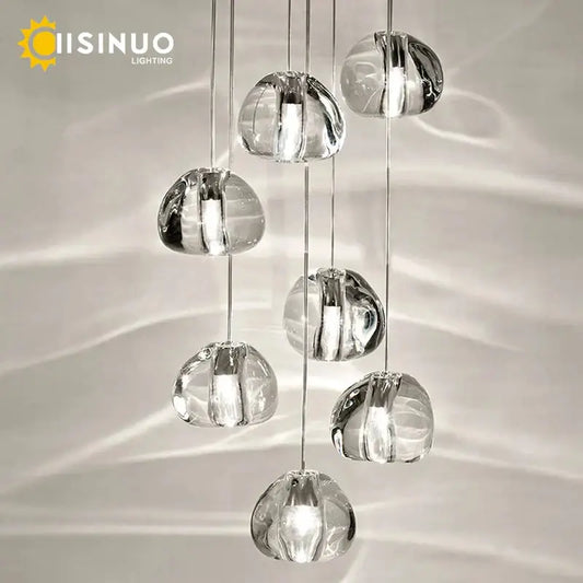 Modern brushed stainless steel pendant light with clear crystal globe cascading design for staircase lighting