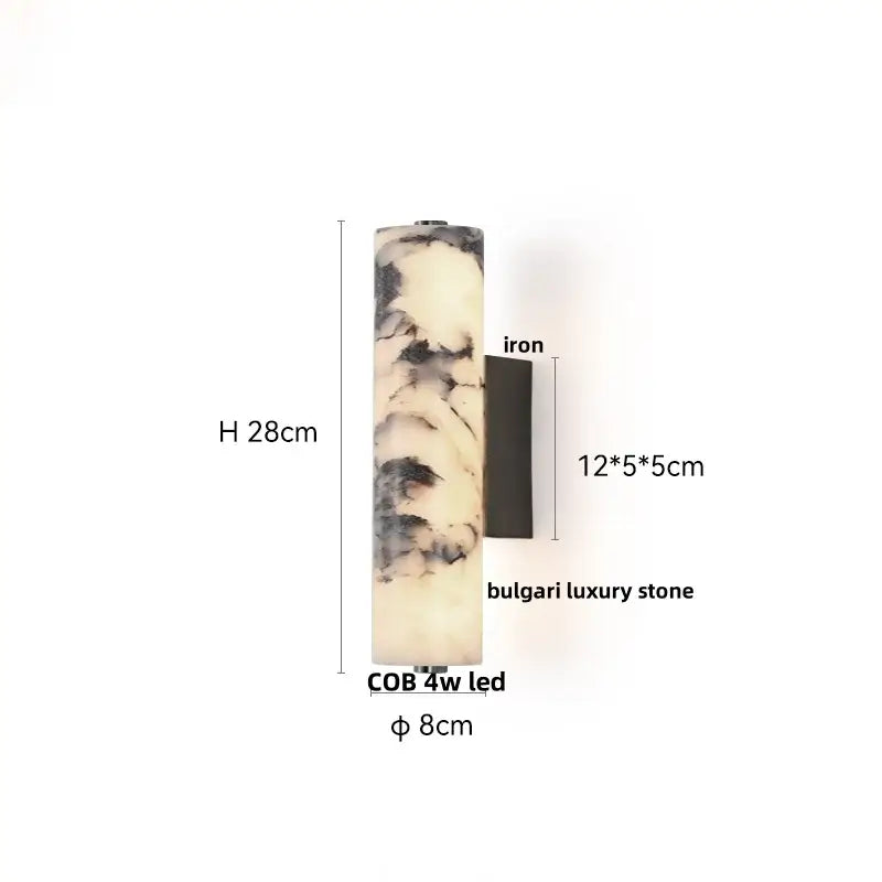 A sleek 28cm tall modern bulgari stone led wall light with cream and black veining on an iron base for decorbites