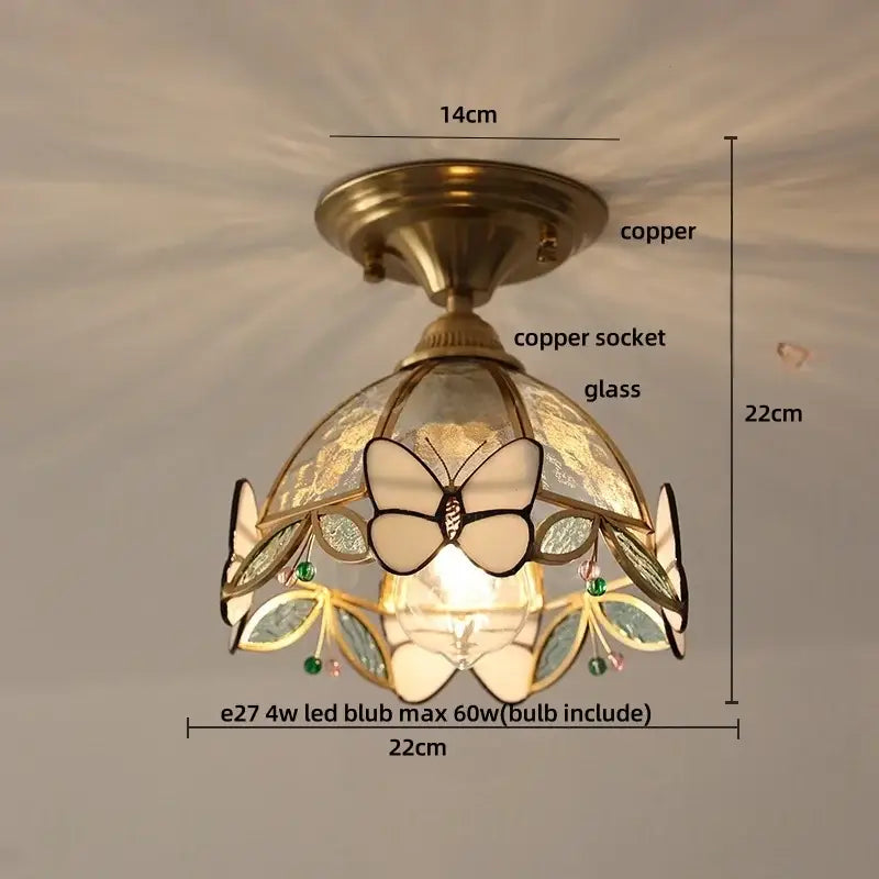 Modern butterfly glass tiffany ceiling light with copper finish and stained glass shade featuring butterfly and green gemstones