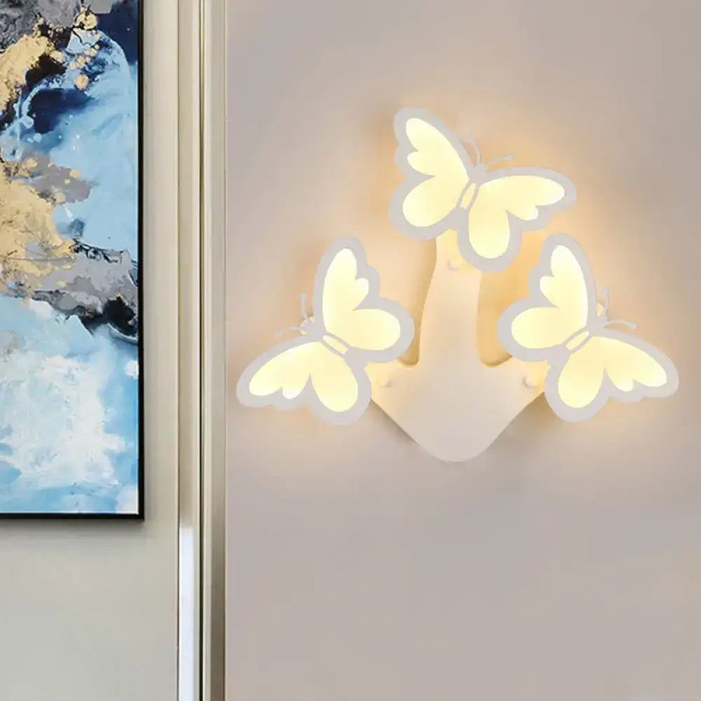 Three-dimensional butterfly shaped modern wall lamp with translucent white acrylic and soft warm glow maximum bulb wattage 6w