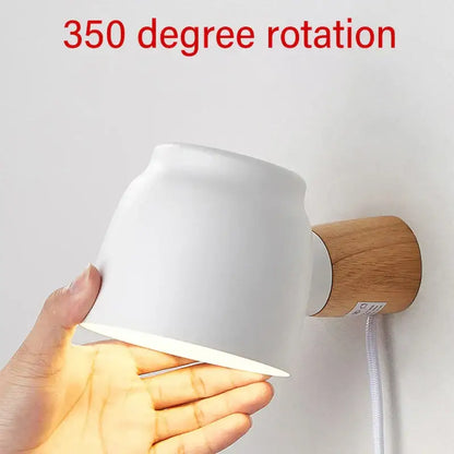 White ceramic and wood led wall lamp with 350-degree rotation ideal as a bedroom reading light source