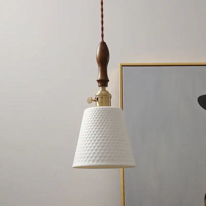 Modern ceramic led pendant light in off-white with a textured finish and dark wood handle for dining room decorbites ceramic led