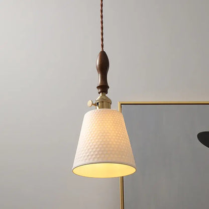 Modern ceramic led pendant light with off-white fabric shade, brass accents, and dark wood finish for dining room decorbites ceramic led pendant