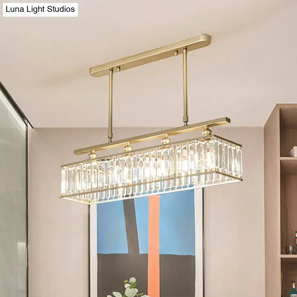 Decorbites sleek 4-head island light with brushed gold frame and clear crystal prisms for elegant island lighting