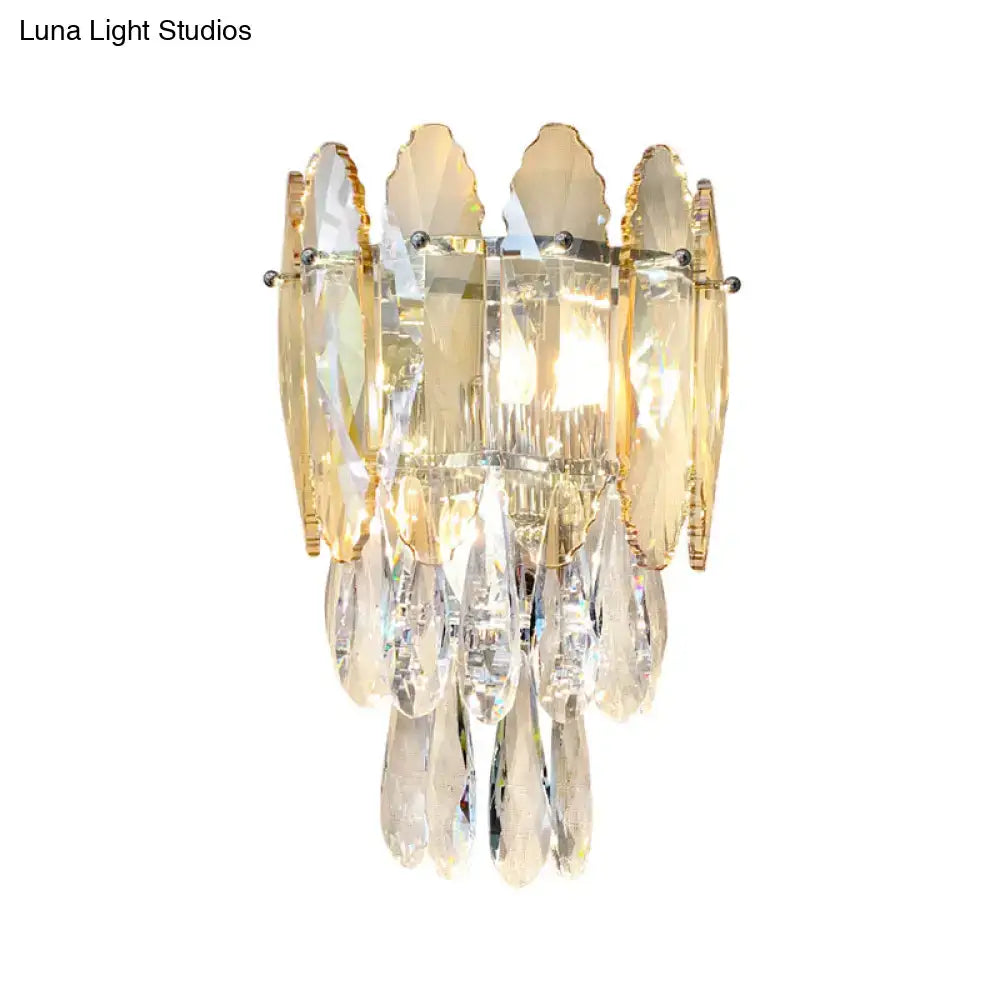 Elegant gold-toned modern champagne smoke gray crystal wall sconce with cascading teardrop pendants and led light for bedroom