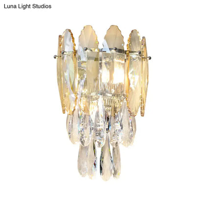 Elegant gold-toned modern champagne smoke gray crystal wall sconce with cascading teardrop pendants and led light for bedroom