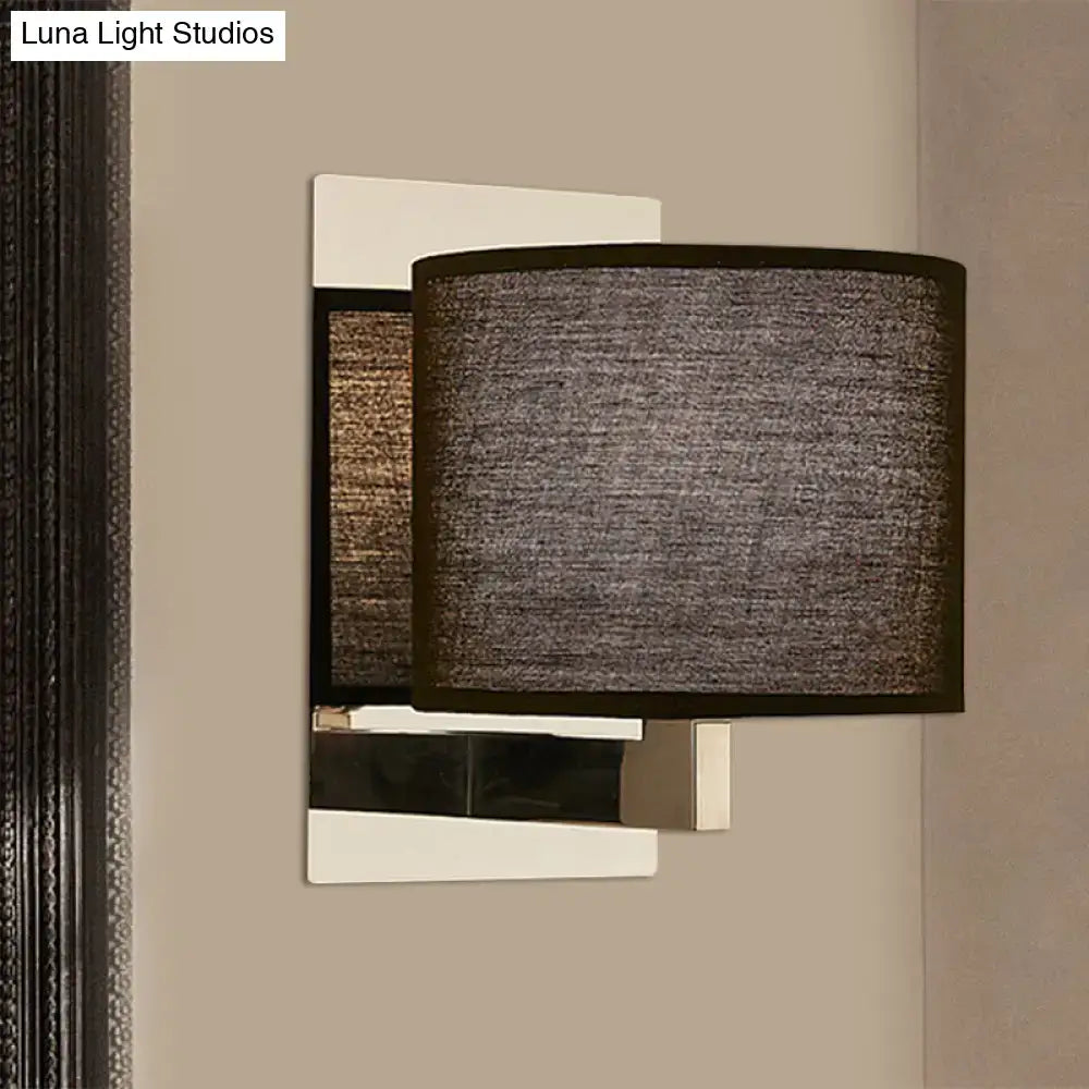 Modern charcoal fabric drum wall sconce with textured shade and white black metal frame for bedroom lighting